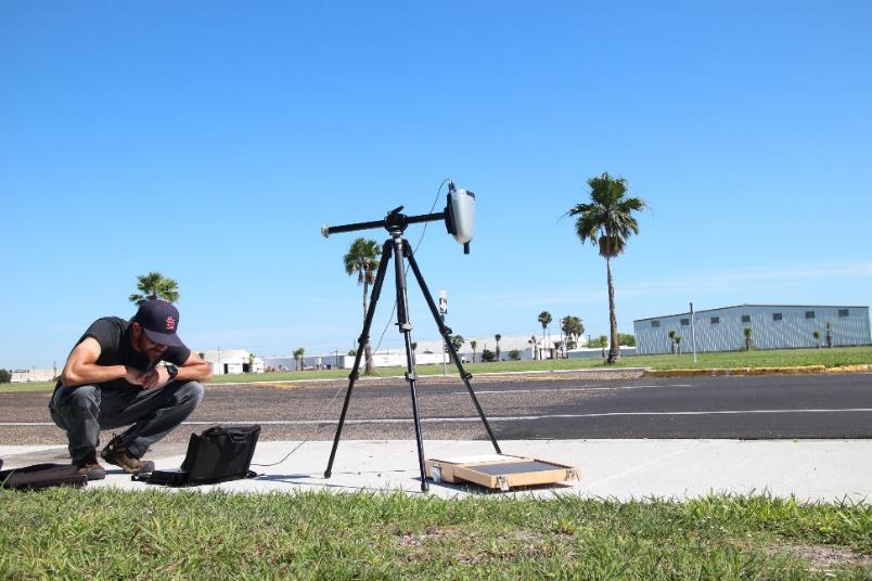 researcher Adam Barnes collecting survey data